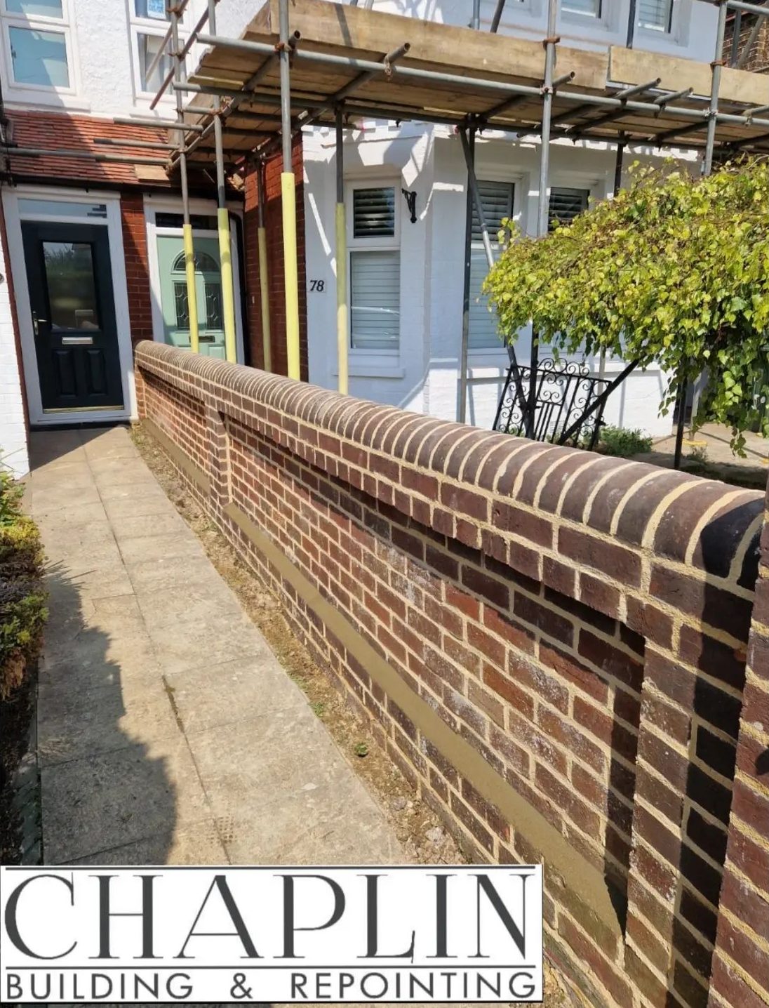 Repointed red-brick front garden wall